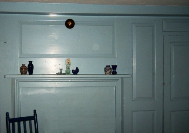 Original paneling in the front room, north side