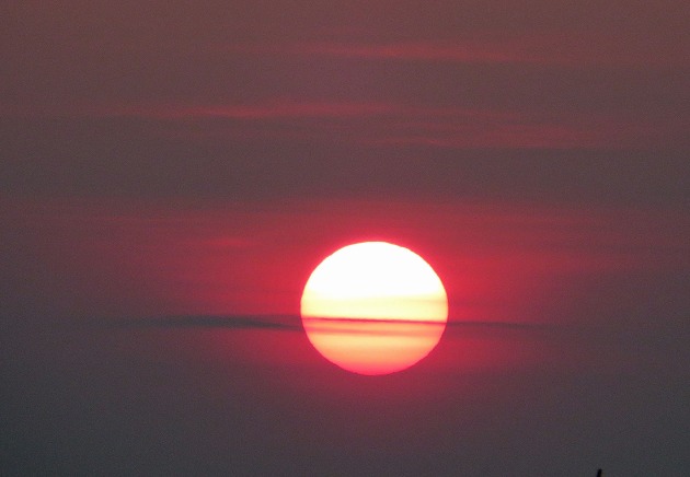 Cory Simons took this sunset photo on July 25, 2014 as smoke from wildfires in western Canada drifted over New England