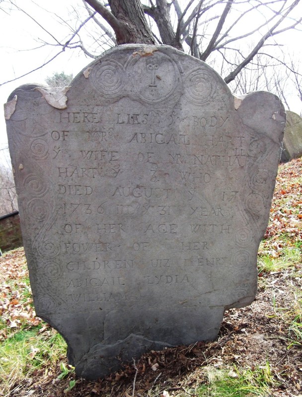 Old North Burying Ground: "Here lies ye body of Abigail Hart, wife of Mr. Nathaniel Hart, who died August 1736 with four of her children: Henry, Abigail, Lydia William." Photo by John Glassford