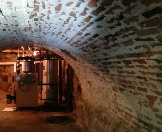 Brick vault supporting the fireplaces in the house at 7 South Village Green