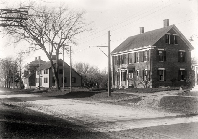 These houses were removed to build the bridge. Note that the large brick house is somewhat similar to one still standing on the west side of the street north of the bridge.