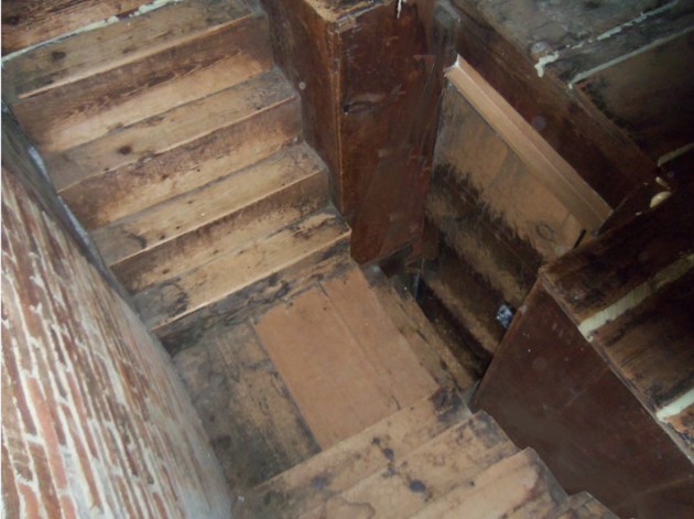 The William Caldwell house was home to two families,. The stairs to the attic split split after the entrance.