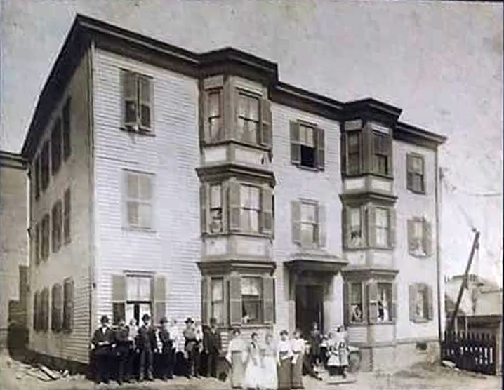 The Dugway family in front of the "French Block" in 1906. Photo courtesy of Deric Marcorelle