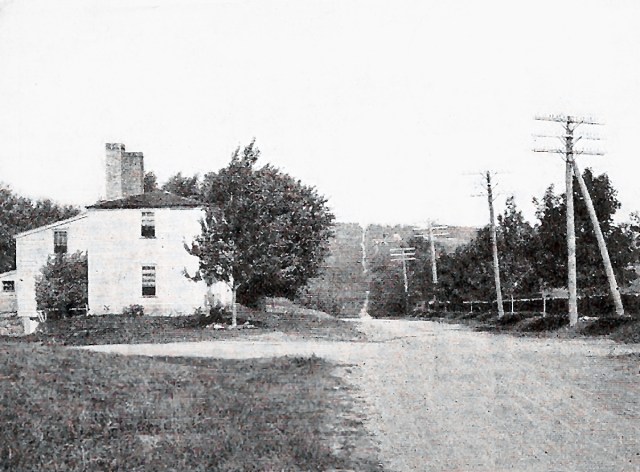 Topsfield toll house for the Newburyport Turnpike. In the distance the road rises over one of several hills.